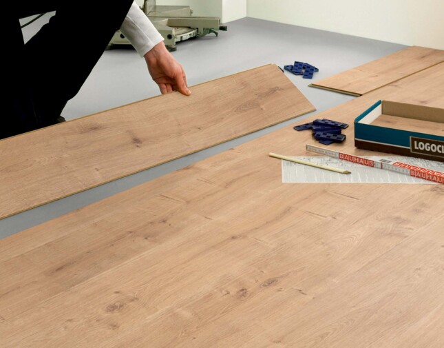 Laminate flooring with attached pad shortens the laying process