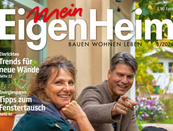 Zeitschriftencover von "Mein EigenHeim" mit einem lächelnden Paar und einem Hund im Garten. Text über Eigenheimbau und Wohnideen.